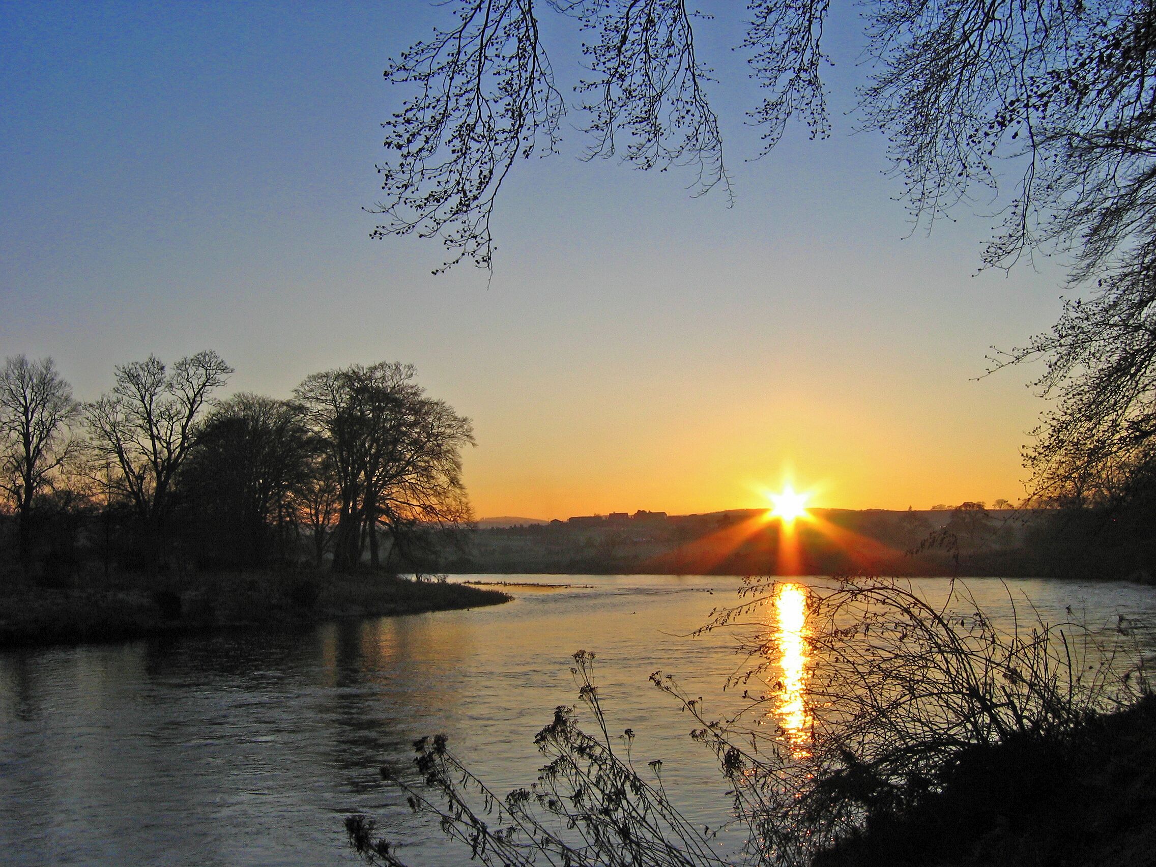 Sunset over Peterculter golf course and the river Dee