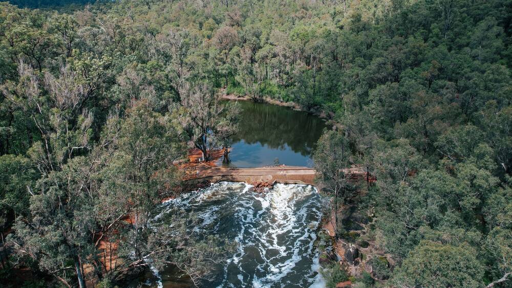 Aerial view of the Australian bush forest and Bob’s Crossing in Lane Poole Reserve in Dwellingup, Western Australia