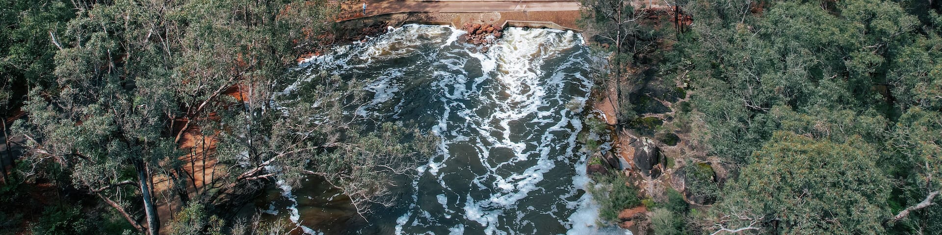 Aerial view of the Australian bush forest and Bob’s Crossing in Lane Poole Reserve in Dwellingup, Western Australia
