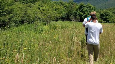 Touching untouched land at Snake Mountain which cuts through Zionville, NC, highlights the beauty of the land that Appalachia stands for. The beauty of the Appalachian Mountains is apparent as my friends and I risk encountering dangerous animals and steep hills as we hike through untamed, flourished plants. Weeding through the hectic trees we encountered an even deeper meaning of untouched land as we came across cows and horses grazing in the land. The beauty of Snake Mountain is apparent as human trails are highlighted with slight indentations in the grass and burnt fire pits that are inhabited by the local animals. The pure lack of industrialization is a welcoming feature and trait of Appalachia that people of the region love and embrace. #appalachianechoes