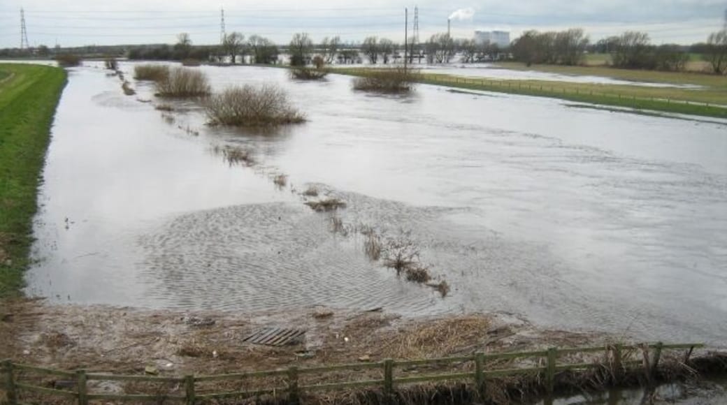 Flow of Aire Eggborough power station in the distance across the flood plain