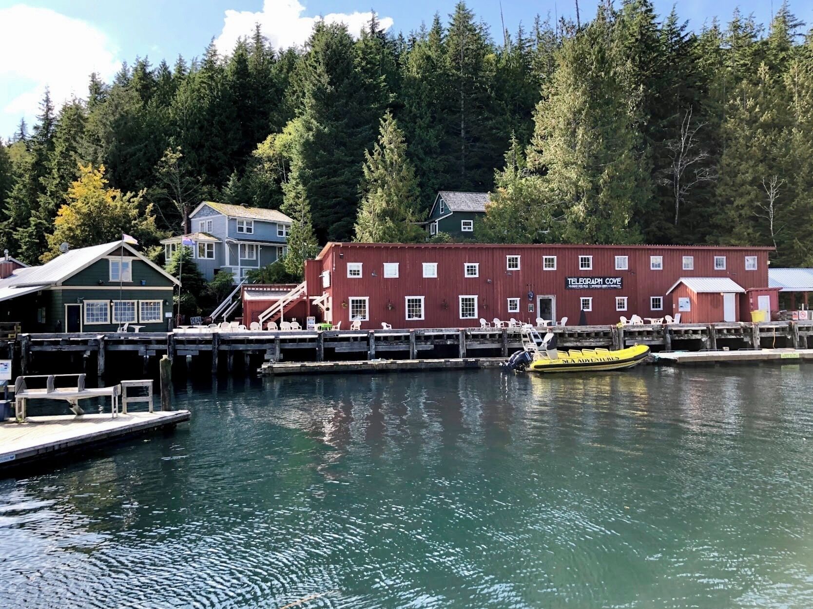 Telegraph Cove was established in 1912 as old sawmill town that had deteriorated to the point where everything had to be restored and rebuilt. Today, an eight hundred foot long boardwalk and dock surround the old village. Telegraph Cove is tucked away on the eastern coast of Northern Vancouver Island. This tiny picturesque and historical village is a major destination during the summer months when the snug little bay bustles with whale watchers, fishermen, boaters, campers and kayakers. Telegraph Cove has a rich and colourful past and is one of the last boardwalk settlements left on Vancouver Island. The Resort at the village has a large variety of accommodations from cozy cabins and historic homes to modern condominium suites. (September 2019)

#History