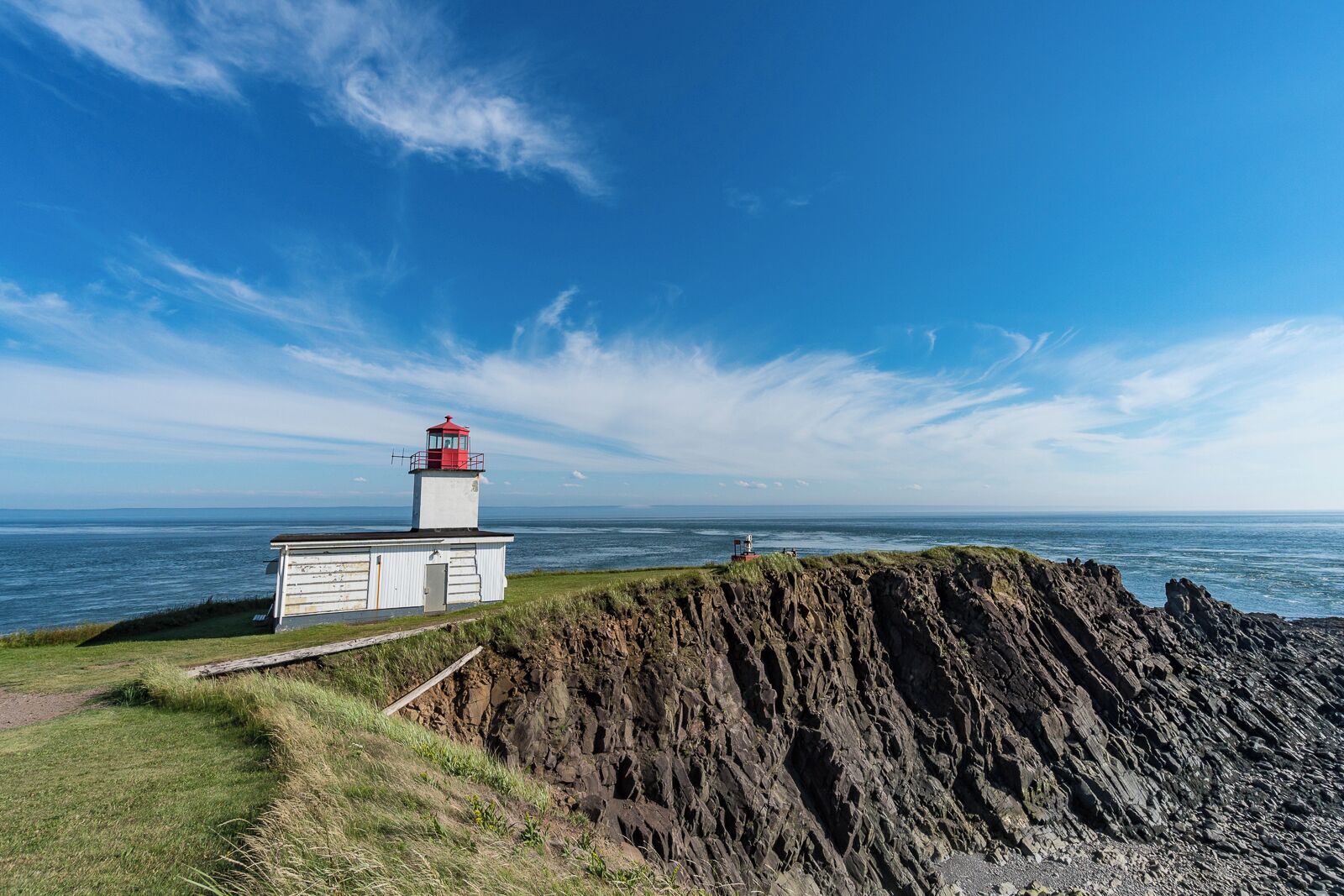 Located near Advocate Harbour, Nova Scotia, the Cape d'Or Lighthouse sits atop a basalt reef in the Bay of Fundy. There is a great restaurant and guest house on site if you are looking for a unique Nova Scotia vacation experience. The current concrete lighthouse was built in 1965.
