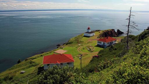 A great place to go for a day trip in Nova Scotia, Canada. The Cape D'Or lighthouse on the Bay of Fundy is a little off the beaten path, but well worth the journey and never crowded. Perfect location to enjoy some peace and quiet while taking in the ocean scenery and tall cliffs along the coastline. To see one of the best sunsets, it's best to stay the night. There is a seasonal restaurant and small inn at the lighthouse keepers buildings.