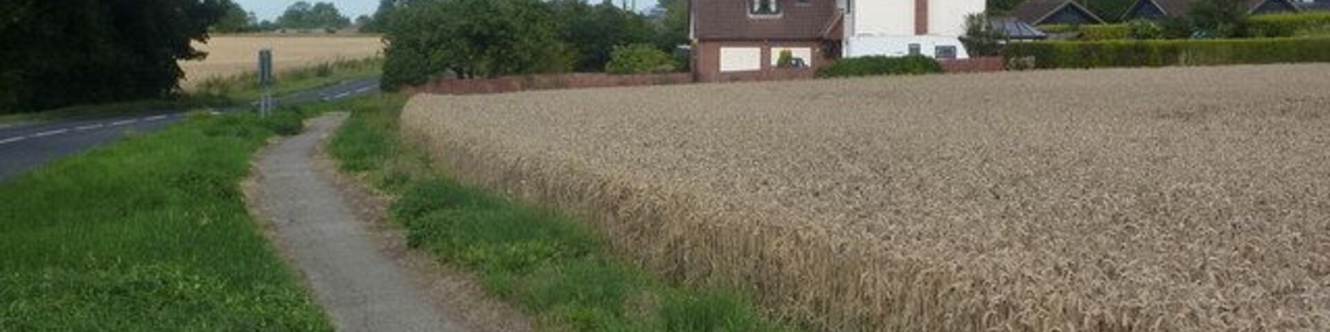 By the A1120 at Forward Green, Earl Stonham The house to the right are on Wicks Lane. Taken standing almost opposite the entrance to the village hall.