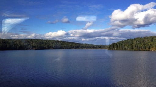 One of a billion lakes it seems out here. Sorry for the glare but it's through a window.