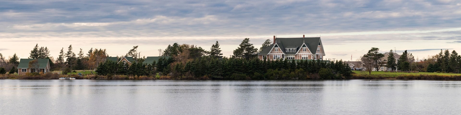 View of the Dalvay Lake and the Dalvay by the Sea Hotel in the north shore of the Prince Edward Island, Canada