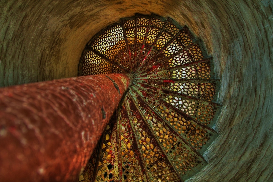 The Long Way Down. Circular interior lighthouse staircase in the Fort Gratiot Lighthouse. Port Huron, Michigan.
