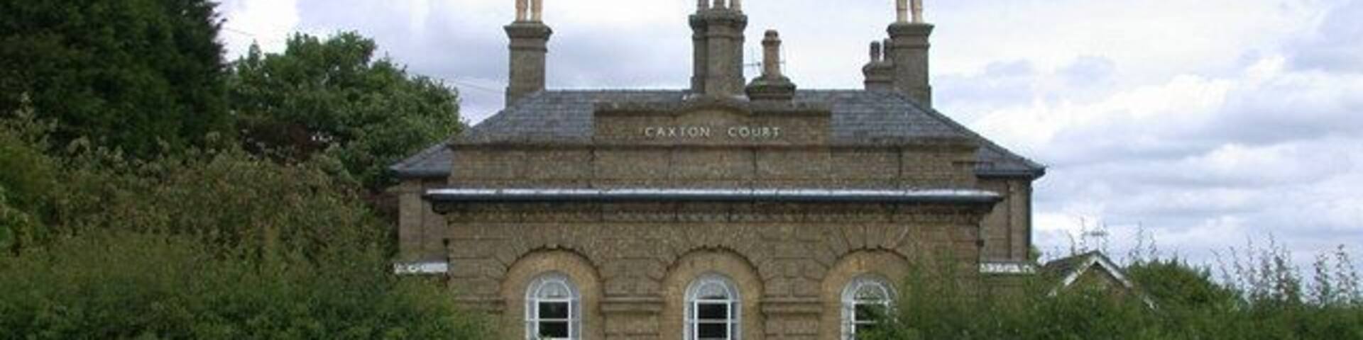 Caxton Court, Ermine Street This is the old Courthouse where Petty Sessions were once held. As far as I can determine, the building straddles the grid line.