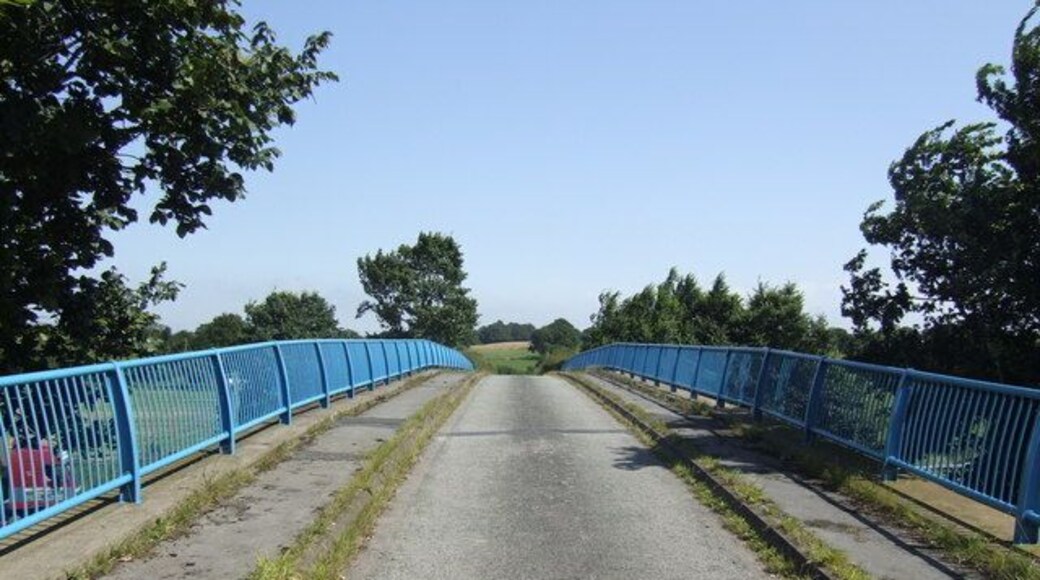 Sky blue The newly painted railings of the bridge over the M6 at Flash Farm.