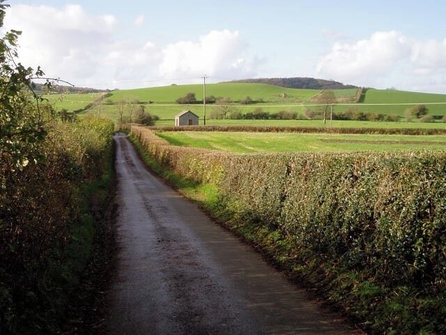 Abandoned building. On the narrow lane from Holme to Beetham is this empty concrete structure with no discernible use. I imagine it might have been a telephone exchange or similar, but I'm open to alternative suggestions.