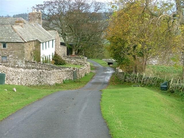 Heltonhead. Looking down the unclassified road to Helton.