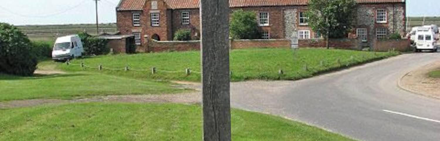 Village sign. On the green beside Harbour Way. See > 838397 for detail. Many local families still make their living by fishing from Brancaster Staithe, which is famous for its first class shellfish. The harbour is also home to Brancaster Sailing Club, and sailing dinghies can be seen stored in and around the harbour. According to most books, Admiral Horatio Nelson learnt to sail at Brancaster but since in the mid to late 18th century there was no such thing as sailing for pleasure, it is more likely that he visited Brancaster Staithe from his home in nearby Burnham Thorpe, and persuaded local fishermen to take him out in their sailing boats.