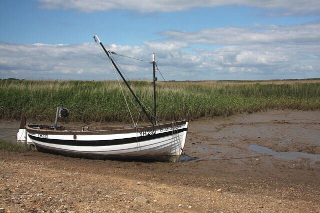The 'Claire Ann' at Brancaster Staithe This boat is moored at the head of the tidal creek.