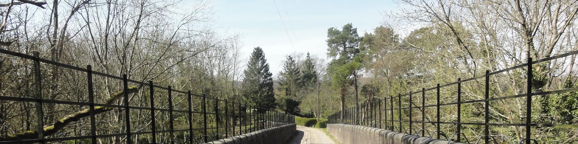 Track going across the now disused railway bridge at Knowle Hill in Mayfield, East Sussex.