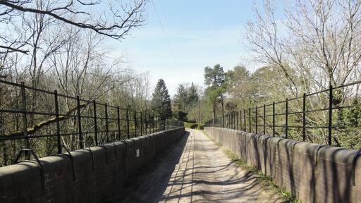 Track going across the now disused railway bridge at Knowle Hill in Mayfield, East Sussex.