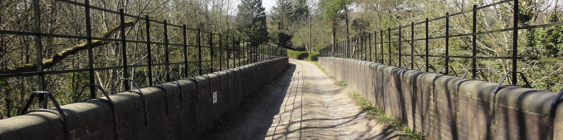 Track going across the now disused railway bridge at Knowle Hill in Mayfield, East Sussex.