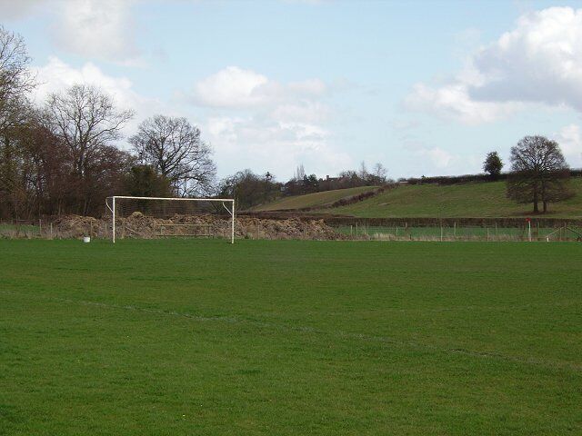 Aynall Lane. Home of Wooferton FC. There are now two pitches, one is in SO5368 and this one belongs here with a view to farmland rising from the Teme Valley. Amusing homophones apart, modern maps spell it "Haynall" but like Spanish, Herefordian English does not do initial "H"s....