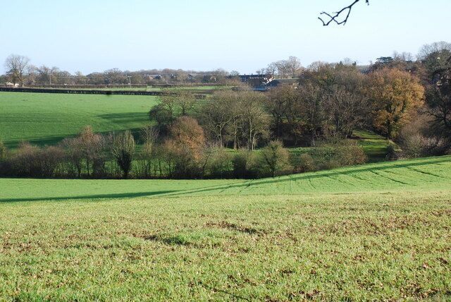 The Bourne Valley Taken from Marshall's Lane looking over The Bourne which at the moment is dry. In the background High Cross can just about be seen.