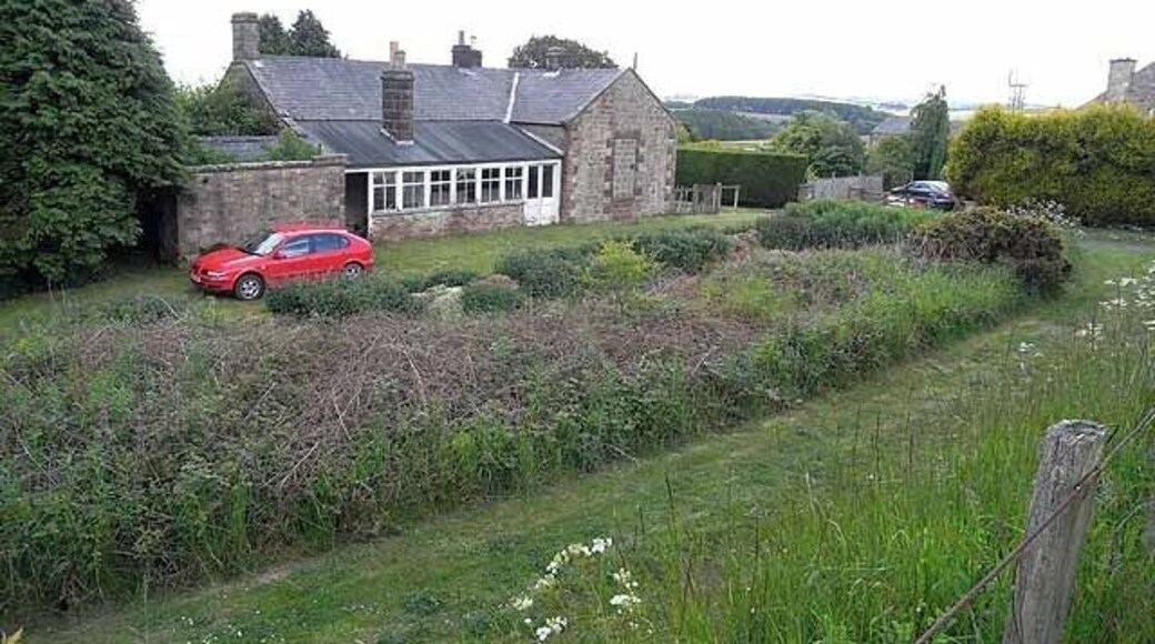 Former Knowesgate Station The Wansbeck Valley Railway ("The Wannie") which meandered across the interior of Northumberland linking Morpeth with Redesmouth on the old Border Counties Railway. The line operated between 1865 and 1966. The car is parked on what was the platform in front of the old station building.