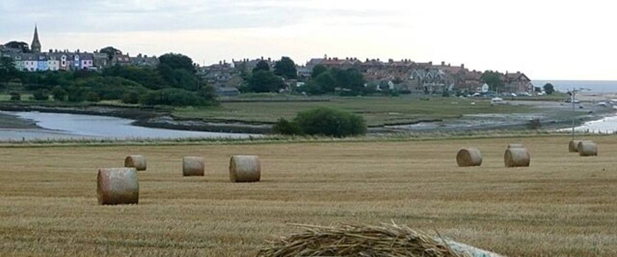 Aln estuary Taken from the National Cycle Network route adjacent to the A1068. These fields overlook the Aln estuary with Alnmouth on a peninsula on the far side.