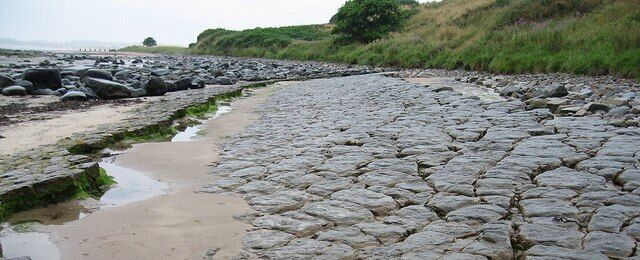 Great Whin Sill The Great Whin Sill formed from molten rock around 300 million years ago. It covers 1,500 square miles, although much of it is below the surface of the land and/or sea. This is the view looking south.