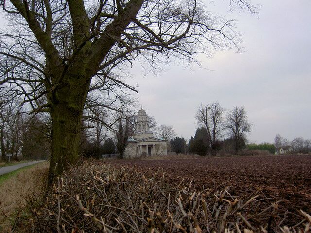 View west across a ploughed field to Milton Mausoleum, Milton, Nottinghamshire