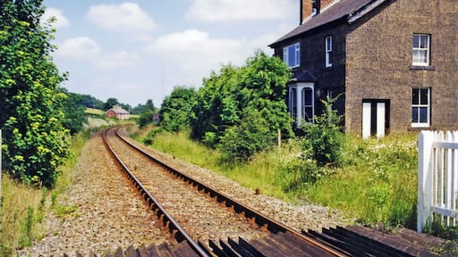 Hanwood station (site/remains). View NE, towards Shrewsbury: ex-GW&LNW Joint Shrewsbury - Buttingon (- Welshpool) secondary main line, junction of branch to Minsterley. The station was closed to passengers 12/9/60 (goods 4/5/64), but the line remains open for trains to Aberystwyth etc. via Buttington and Welshpool. The Minsterley branch, which joined about a half mile to the west, was closed to passengers 5/2/51, to goods 1/5/67.
