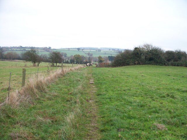 Footpath to Nethercote Passing St Michael and All Angels church, the footpath from Great Wolford descends the hill towards Nethercote.