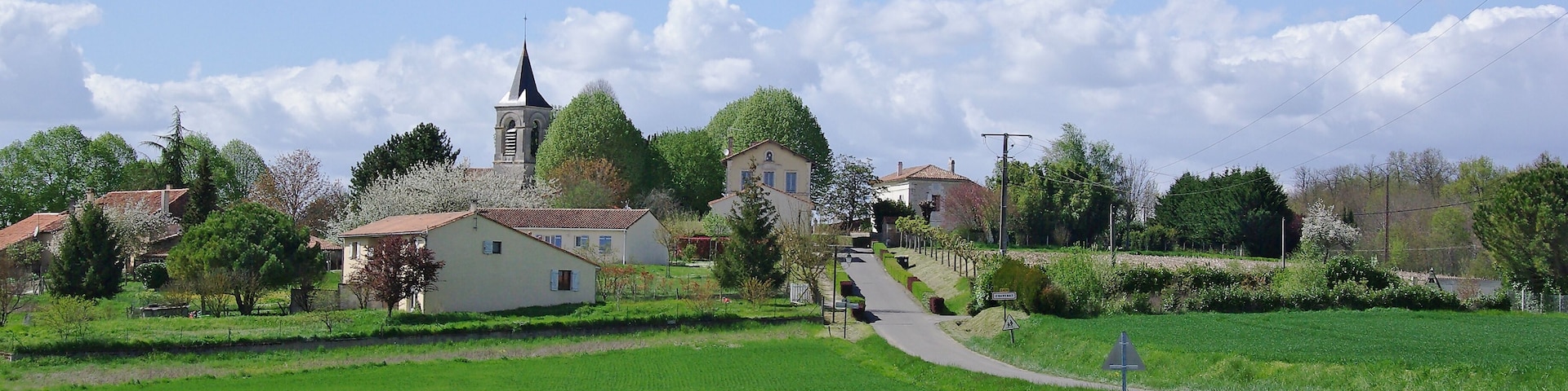 S.-E. view of the village, from road D 439. Chavenat, Charente, France.