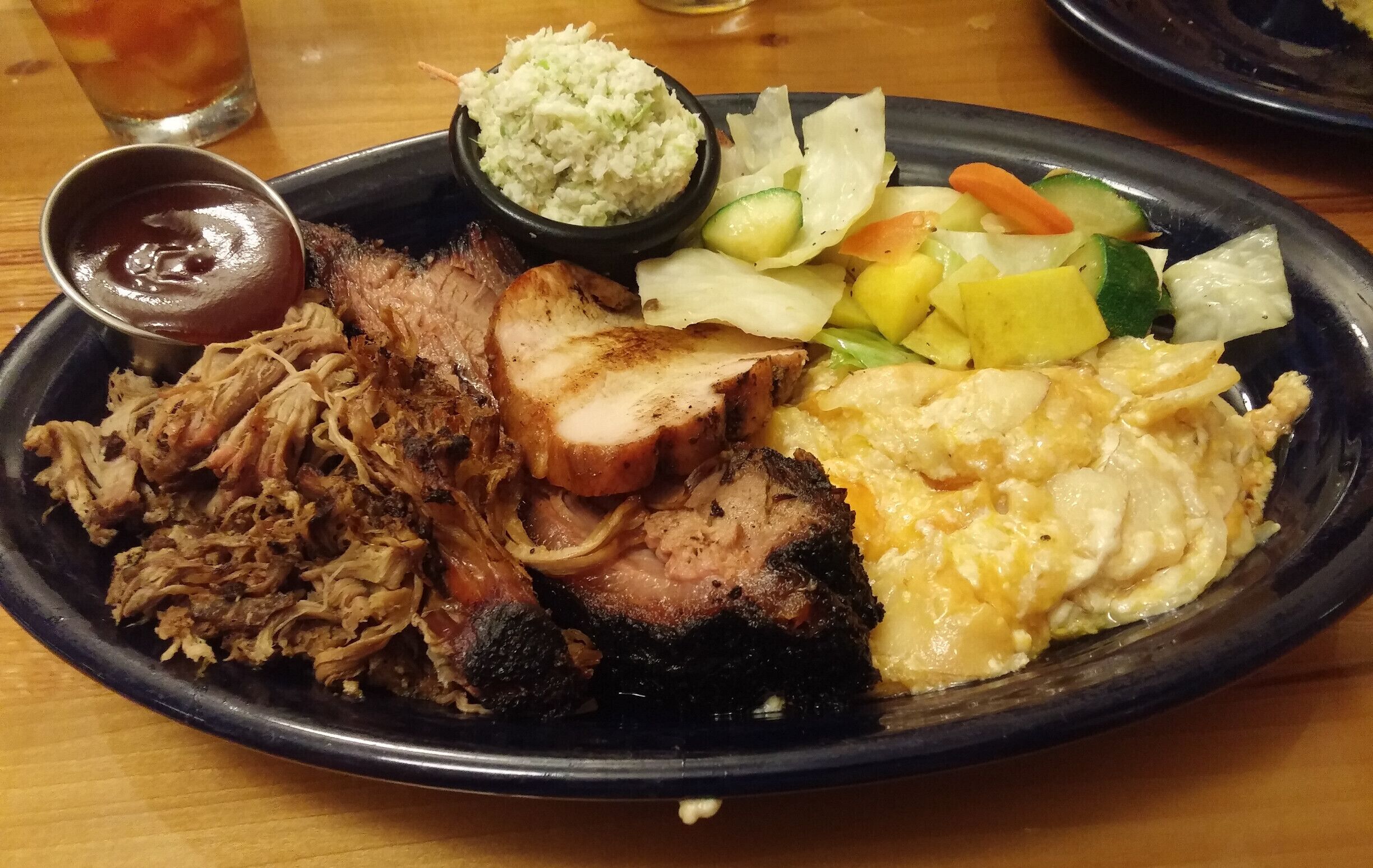 The Pride of the Pit from the dining lodge inside Lake Hope State Park!

Hickory smoked beef brisket, pulled pork and maple glazed smoked Ohio turkey rounded out with a vegetable medley (cabbage, squash, carrots and zucchini) and three cheese au gratin potatoes.

Great view of Lake Hope and the surrounding forest and #delicious food!