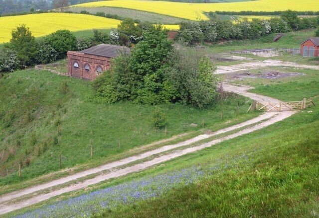 Disused water treatment works Below Thrybergh reservoir dam, bluebells abound.