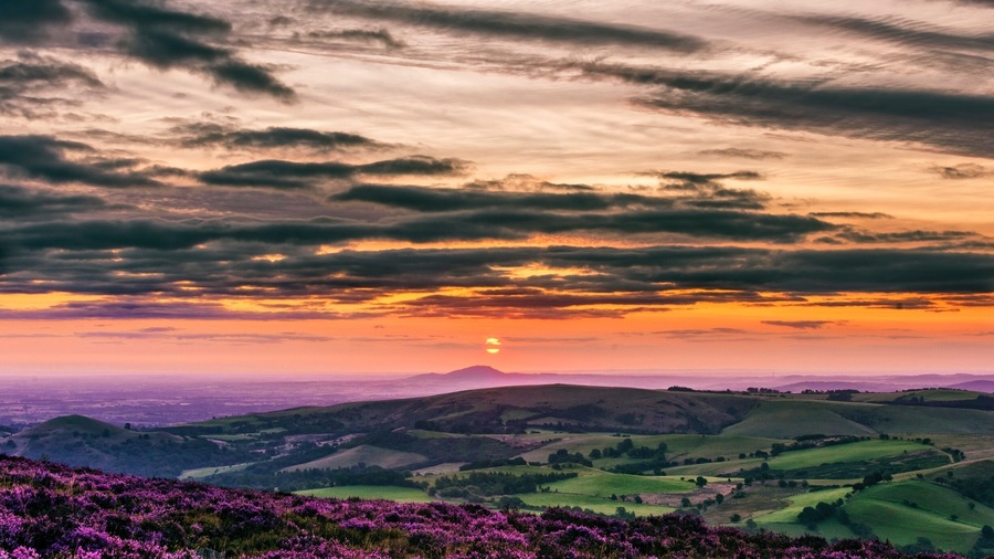 Camp on top of Stiperstones for epic sunrises over the volcanic landscape of the Wrekin formed by layers of ancient lava flows laid down in a volcanic island arc 680 million years ago