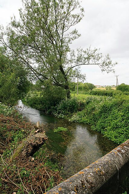 River Bourne downstream of the road bridge in Ford village.