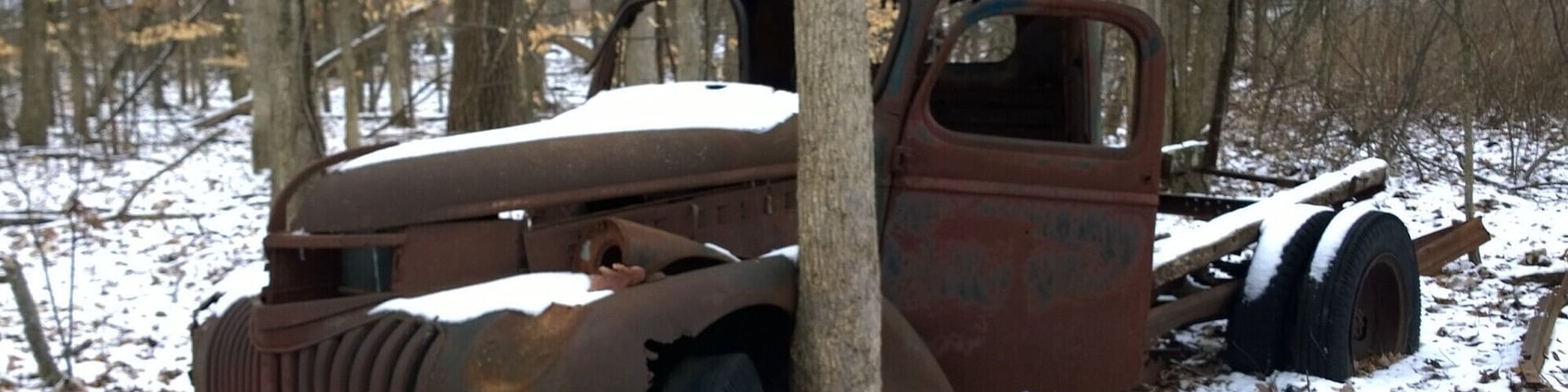 An abandoned truck still residing and rusting away just off the trail at Glacier Ridge Metro Park.