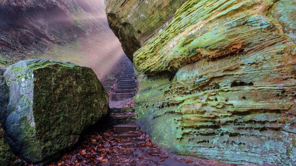 A rock formation with a staircase carved into it.