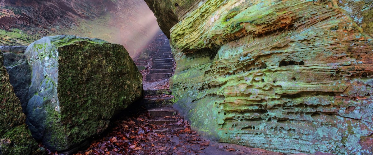 A rock formation with a staircase carved into it.