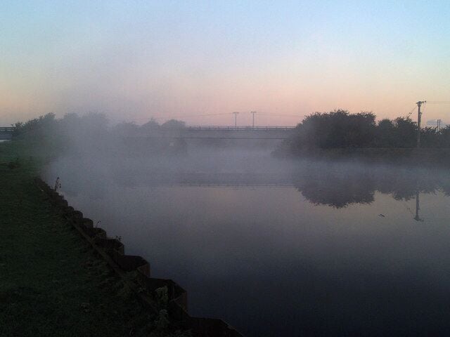 Mist over the River Dun Navigation The railway bridge can just be seen.