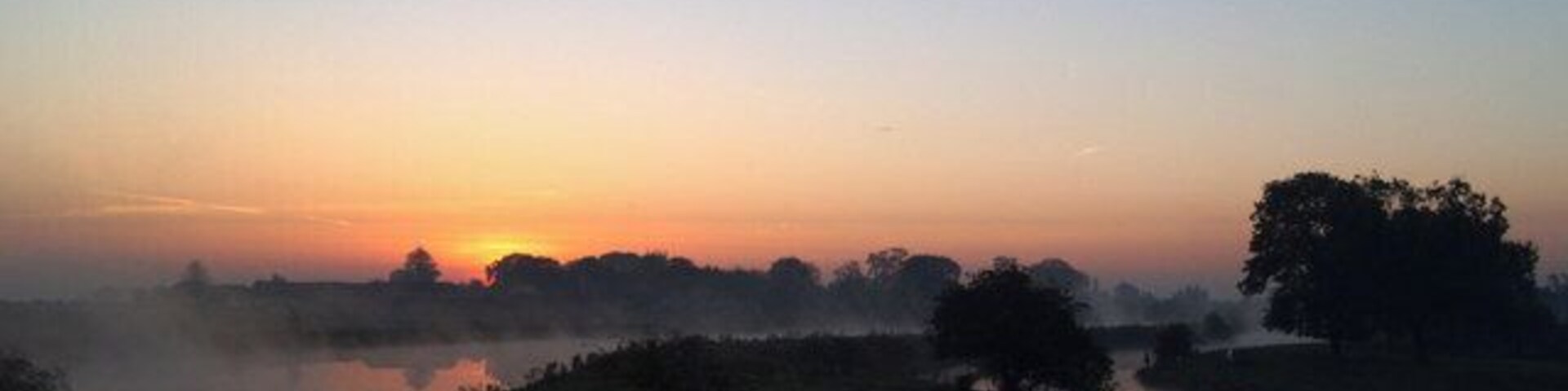 Sunrise Barnby Dun On the left the River Dun Navigation and on the right the old River Don.