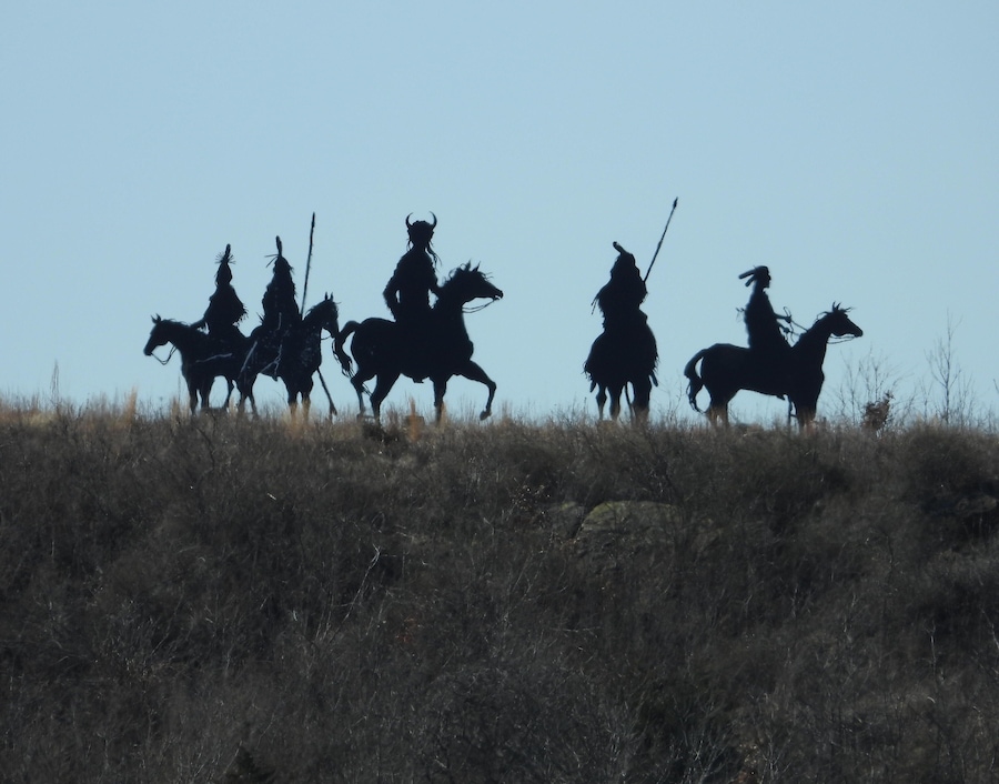 Life-size metal silhouettes of native Americans on the hill by Hominy, OK. Hominy is on the way to the Tall Grass Prairie on Highway 99.