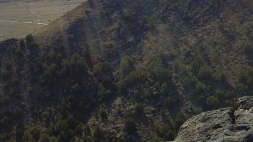 View from the top of Black Mesa. My friend Josh and I hiked and climbed up the north side of the mesa. It was probably a rise in elevation of 800 feet. We crossed over the top of the mesa to take this picture on the south edge. It shows really well how the mesa is like a mountain with the top leveled off.