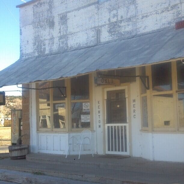 Kenton, Oklahoma is one of the most unexpected towns in the state. The 2010 census tells us that Kenton has a population of 17. This store, The Kenton Merc is opened irregularly. If you're lucky to blow through when they're open, drop in to check out the fossilized mammoth tooth and the baby rattler they keep inside. 