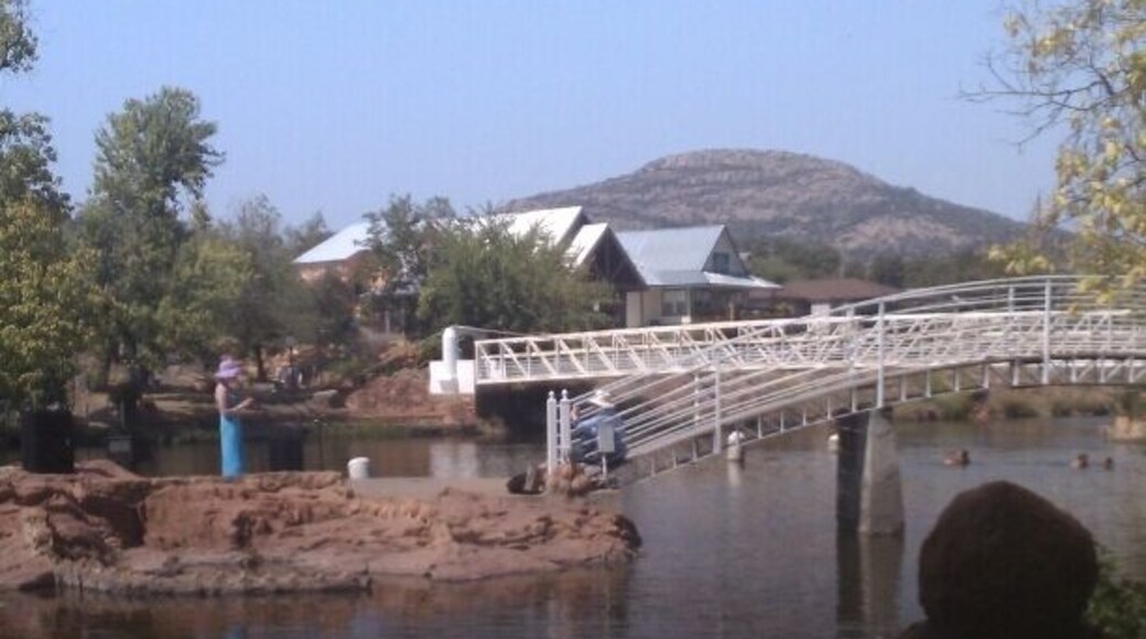 During the native american flute fest, they played on the river stage with the backdrop of the mnt behind the players.