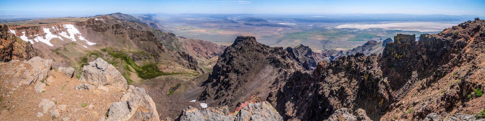 The jagged cliffs on the East side of the Steens Mountain Summit above the Alvord Desert in Southeastern Oregon; Frenchglen, Oregon, United States of America