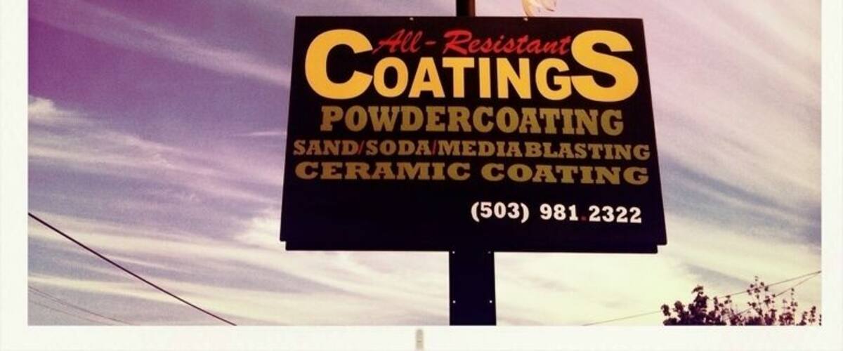 A sign for All-Resistant Coatings offering services like powdercoating, sand/soda blasting, and ceramic coating.