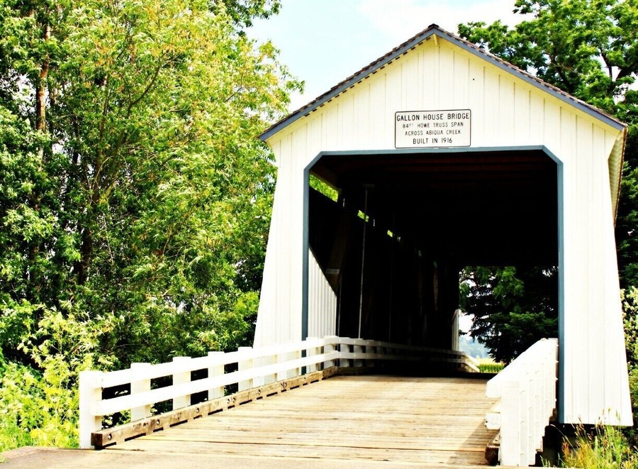 Located NNW about 2 miles from Silverton, Oregon - back roads towards Mt. Angel. Built in 1916 and is a covered bridge you can drive over