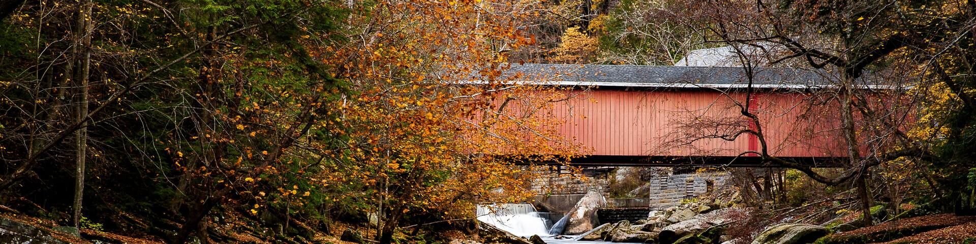 Historic Covered Howe through truss in Autumn - McConnell's Mill Covered Bridge - Pennsylvania