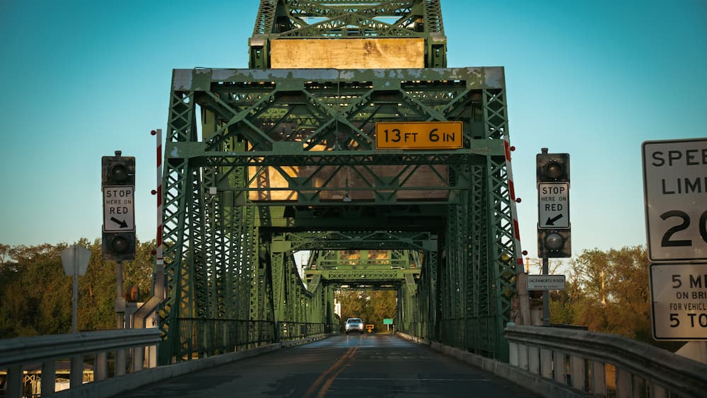 West Side Entrance of the Freeport Bridge – Steel and Sky Perspective