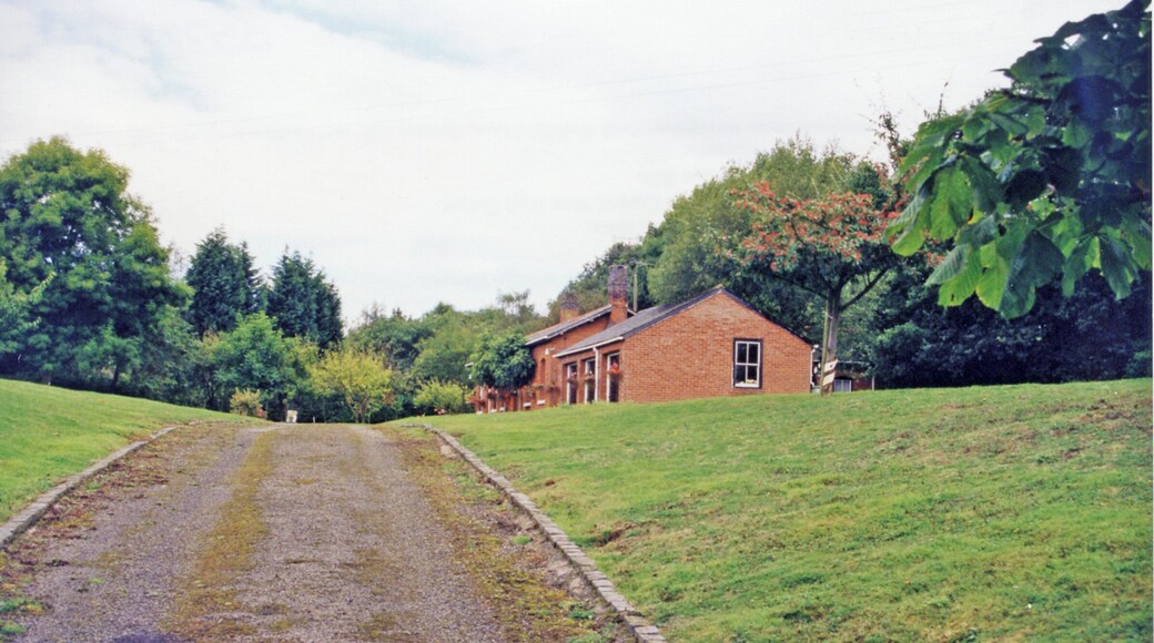 Knightwick: site/remains of station, 1999. View eastwards, towards Worcester: ex-GWR Worcester - Bromyard - Leominster line. The station closed 7/9/64 along with the remnant of the branch to Bromyard; Bromyard - Leominster has been abandoned since 15/9/52.