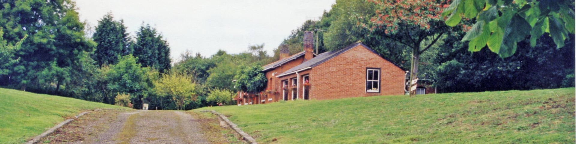 Knightwick: site/remains of station, 1999. View eastwards, towards Worcester: ex-GWR Worcester - Bromyard - Leominster line. The station closed 7/9/64 along with the remnant of the branch to Bromyard; Bromyard - Leominster has been abandoned since 15/9/52.
